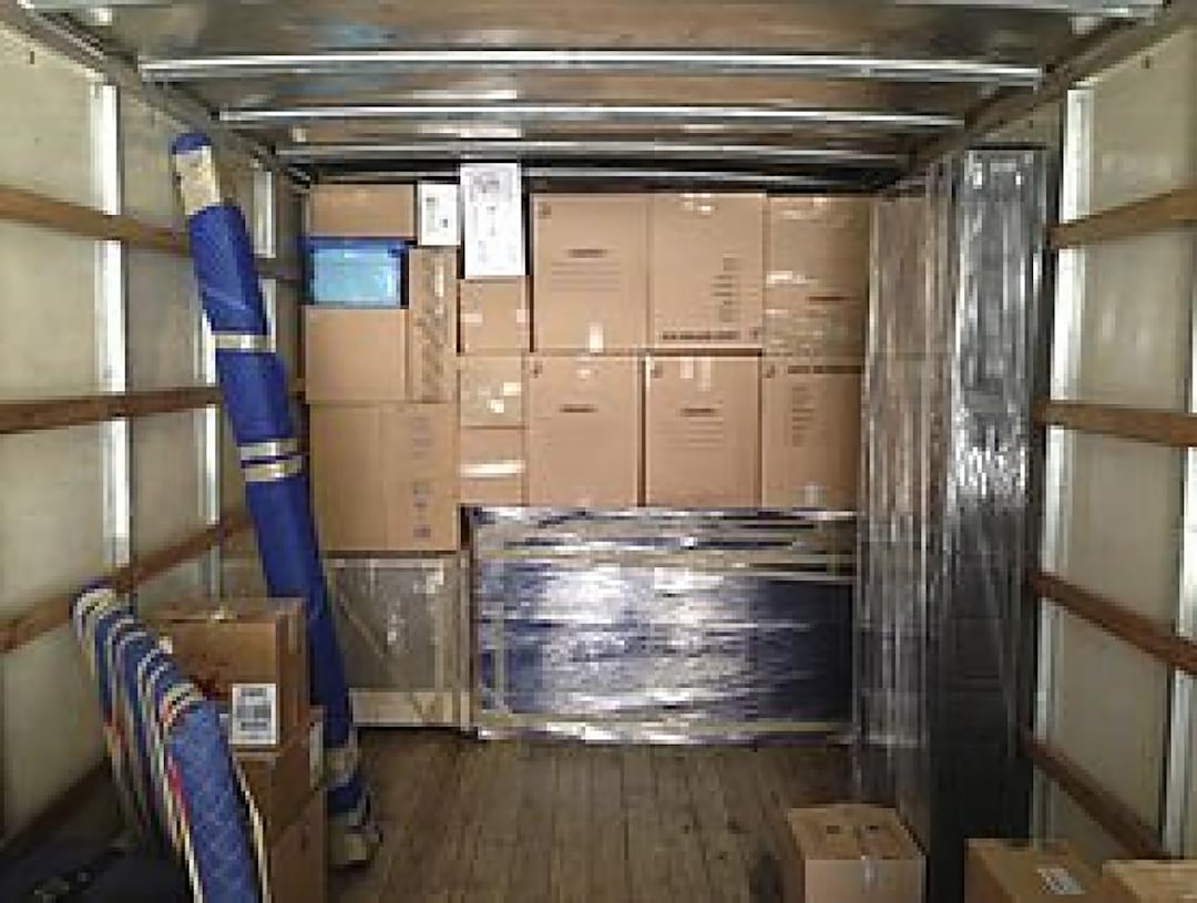 why-choose-us a-truck-with-a-bunch-of-boxes-in-the-back-of-it-jv1swo4fghi